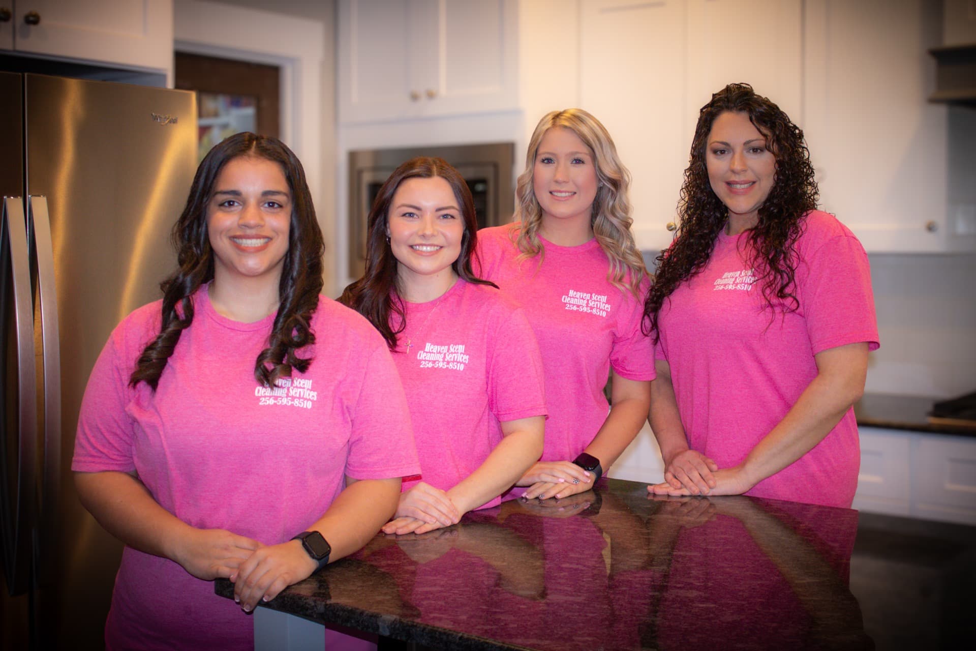 The Heaven Scent Cleaning Services team in branded shirts